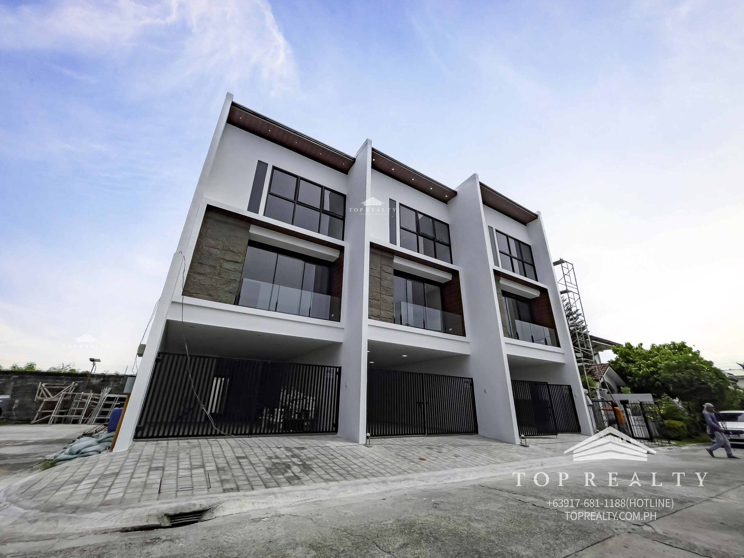 https://toprealty.com.ph/wp-content/uploads/2022/12/facade-2-scaled.jpg
